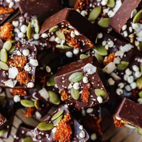 Chocolate cacao truffles with seeds and dried fruit topping for Superberry Cacao Truffles.