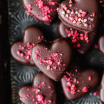 Heart-shaped chocolates with pink sprinkles for Delight Fuel.
