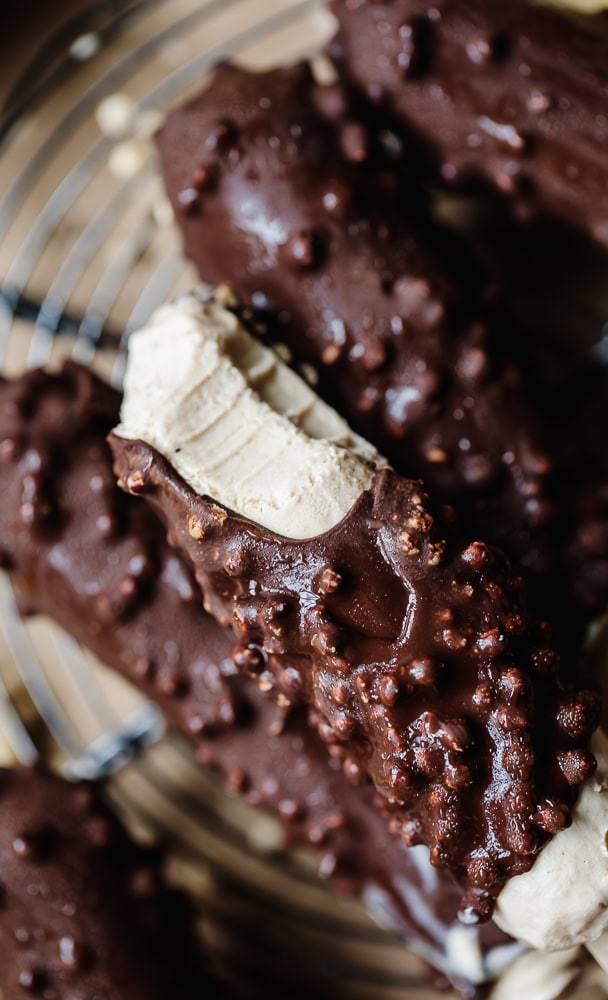 Close-up of Delight Fuel chocolate bar with nuts and creamy filling.